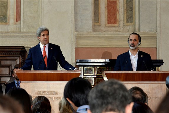 [U.S. Secretary of State John Kerry Kerry delivers a joint press statement with Syrian Opposition Council Chairman Mouaz al-Khatib and Italian Foreign Minister Giulio Terzi , not pictured, in Rome, Italy, on February 28, 2013. Image from US Department of State.] 