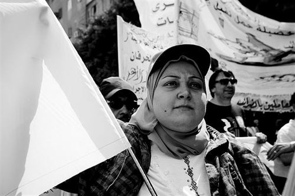 [Egyptian workers march to Shura Council on May Day 2013. Image by Gigi Ibrahim via Flickr]