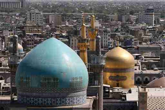 [The Golden dome of the mausoleum of Imam Reza the 8th Shi`i Muslim`s Imam and grandson of the Prophet Mohammad is seen in Mashhad, 900 km (540 miles) in northeastern of Tehran, Iran, 11 August 2008. Image by Hasan Sarbakhshian via AP Photo]