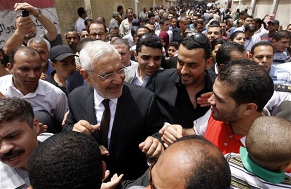 [Egyptian presidential candidate Abdel-Moneim Abolfotoh visits a polling station in Nasr City, Cairo, Egypt, May 23, 2012. Image by Fredrik Persson/AP Photo.]