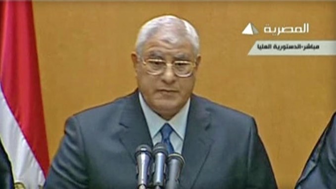 [SCC head Adly Mansour swears in as interim president on Thursday, July 4. Image from Egyptian TV via madamusr.com.]
