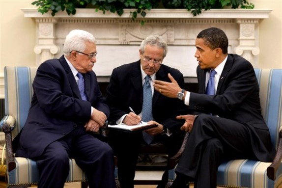 [President Barack Obama meets with Palestinian Authority President Mahmoud Abbas in the Oval Office Thursday, May 28, 2009. The man sitting between them is an interpreter. Image by Pete Souza via Wikimedia Commons.]