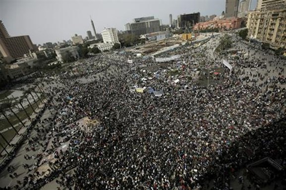 [Midan al-Tahrir, 1 pm Today. Image from Marco Longari, AFP/Getty Images]