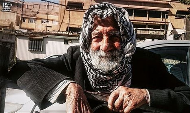 [Image of a Syrian man in Rabweh, Damascus, enjoying a day free from airstrikes. Image by Dimashqi Lens via flickr]