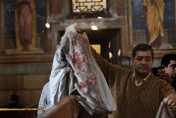 [Bloodstained belongings of those killed at chapel of the Coptic Orthodox Cathedral of Abbasiya on 11 December 2016. Photo by Jonathan Rashad]