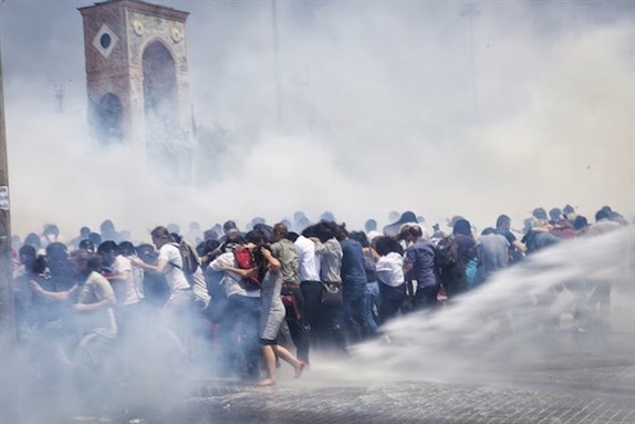 [Riot police attack protesters in Gezi Park, 31 May 2013. Photo by Eren Aytug/Nar Photos.]