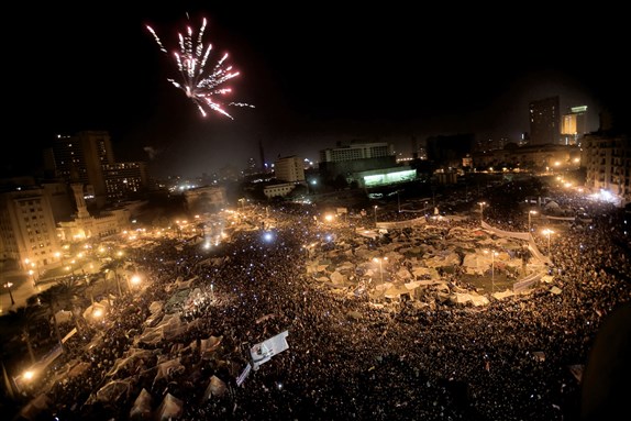 [Fireworks in Cairo`s Tahrir Square, February 11, 2011. Image from AFP/Getty]