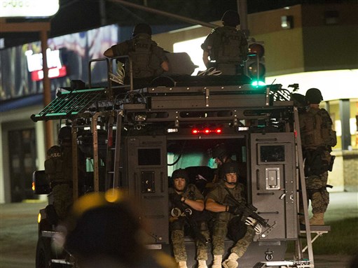 [Ferguson, Missouri, has turned into a \"war zone\" as riots over police shooting take hold of town. Image from business insider.com]