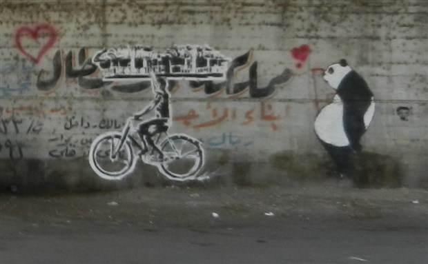 [Cairo Graffitto by Ganzeer and Sad Panda. Image from Elliott Colla]