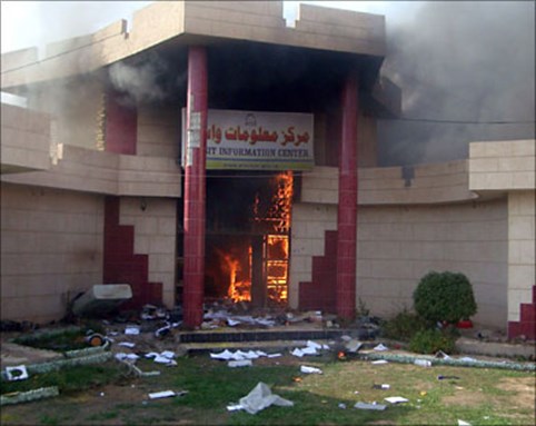 [Government building in flames after protests in al-Qut. Image from al-Jazeera]