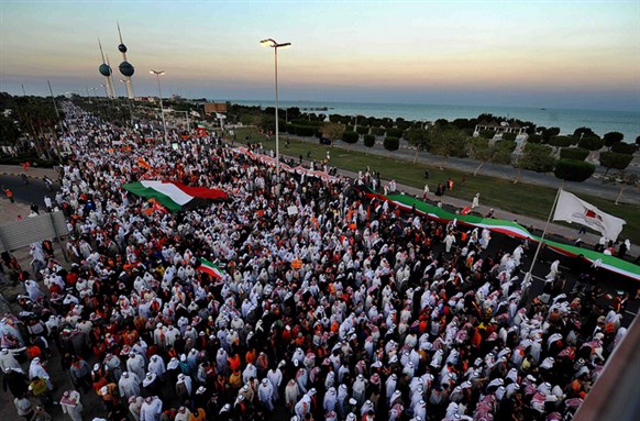 [Protest in Kuwait City condemning the changes in voting procedures and calling for a parliamentary election boycott. 30 November 2012. Image from Ra`ed Qutena/flickr]