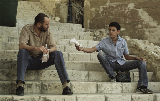Photo still from the film \"The Last Friday\" featuring Youssef (Ali Suleiman) and his son Imad (Fadi Arida).