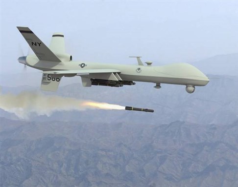 [An MQ-9 Reaper drone firing a missile. Image from An Honorable German/Creative Commons]