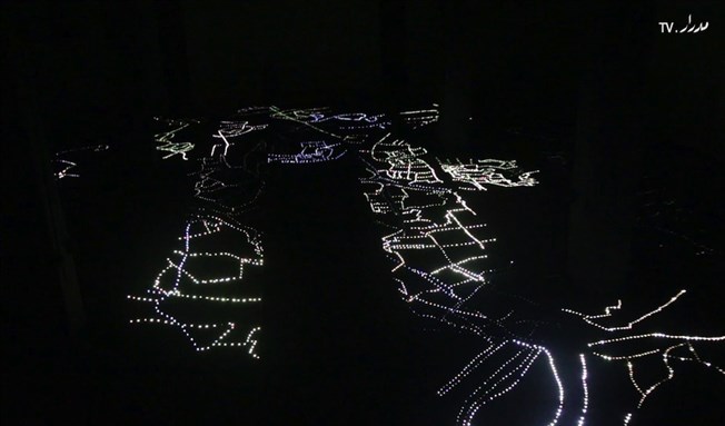 [From above, Magdi Mostafa`s installation offers a birds eye view of a familiar city. Image courtesy of Medrar TV.]