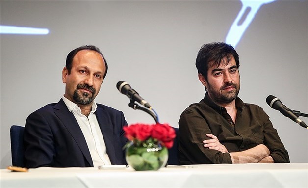[Iranian Filmmakers Asghar Farhadi and Shahab Hosseini at \"The Salesman\" press conference. Photo by Hamed Malekpour, Wikimedia Commons]