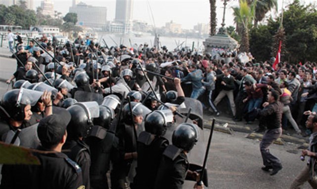 [Police face demonstrators in Cairo, Tuesday 25 January, 2011. Image from unknown archive.]