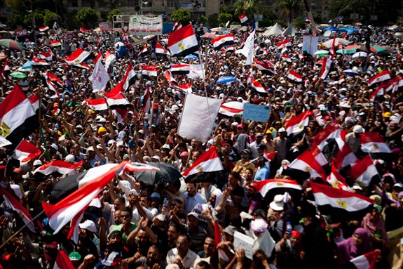 [A rally in support of Morsi. Photo by Virginie Nyugen via madamasr.com]