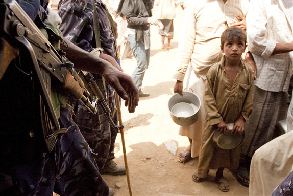 [A Yemeni child at Mazraq IDP camp in 2009, displaced from his home in Saada during \"Operation Scorched Earth.\" The camp was bombed by Saudi Arabia five days after Operation Decisive Storm began in March 2015. Image from Paul Stephens/IRIN.]