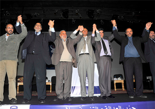 [PJD party leaders celebrate their win in Morocco`s legislative elections. Image by Magharebia/Flickr.]