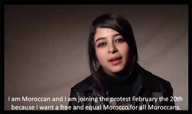 [Image of Amina Boughalbi from a video calling for protests on 20 February 2011. Screenshot taken from Youtube.]