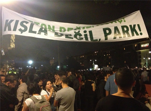 [Sign reads \"Park Not Barracks.\" Image taken on 29 May 2013 by Nilay Özlü/Ottoman History Podcast website.]