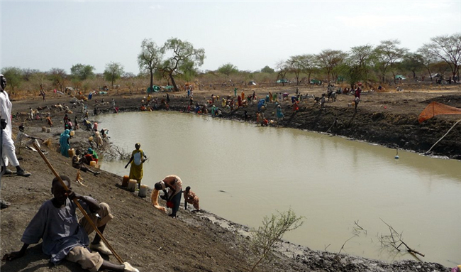 [Over one hundred thousand Sudanese have settled in the Maban county of the Upper Nile state in South Sudan following fighting in the Blue Nile state of Sudan. In Hofra transit camp, the biggest challenge is providing enough clean drinking water. Image by Thomas Conan/Flickr.]