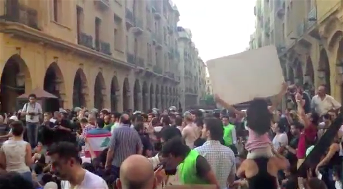 [Screenshot from video below of anti-extension protest in Beirut, Lebanon.]