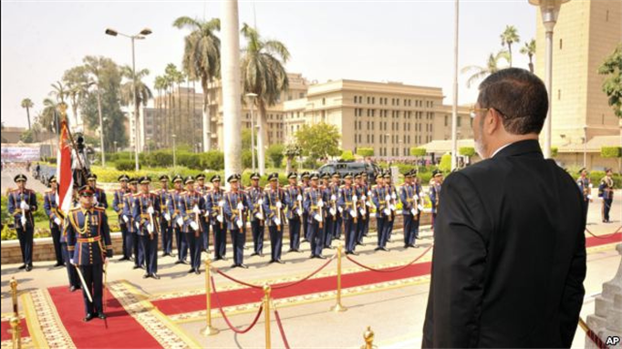 [President Morsi back in 30 June 2012. Image originally posted to Flicker by Abayomi Azikiwe]