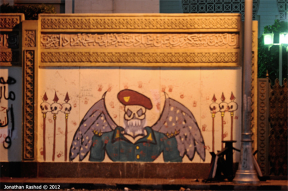 [Anti-military graffiti on presidential palace wall. Image originally posted to Flicker by Jonathan Rashad] 
