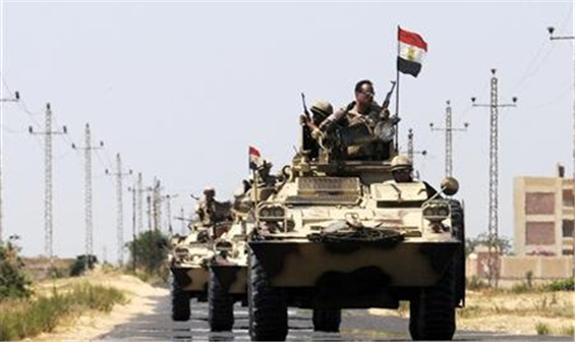 [Egyptian military in Al-Arish, Sinia, Egypt. Image originally posted to Ahram Online/Reuters] 