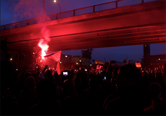 [10 February 2012, protesters in Egypt at night. Image originally posted to Flickr by Sarah Carr]