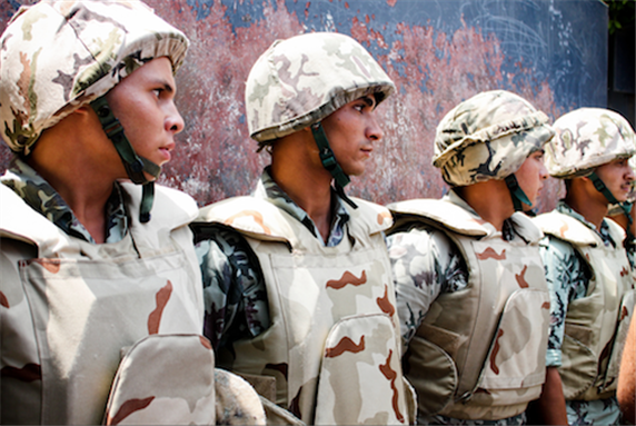 [14 August 2011, the military blocks the gates into the ministerial cabinet, Egypt. Image originally posted to Flickr by Nora Shalaby]