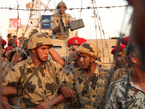 [23 July 2011, Army barricade at Nour Mosque, Abbasiyen, Egypt. Image originally posted to Flickr by Nora Shalaby]
