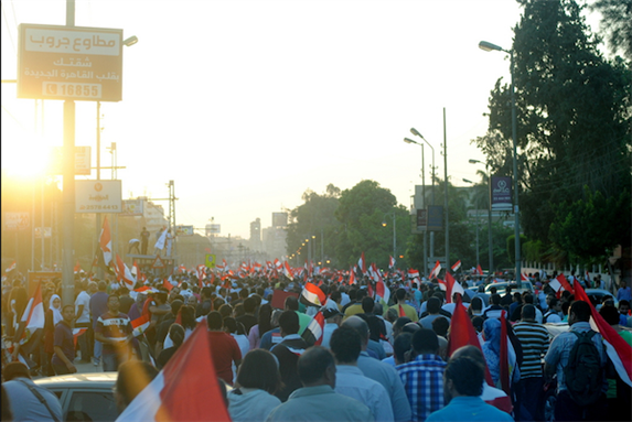 [28 June 2013, Anti-Morsi protesters take the streets to demand the disposal of Mohamed Morsi, these demonstrations began as a preparation of the 30 June uprisings, Cairo, Egypt. Image originally posted to Flickr by Lilian Wagdy] 