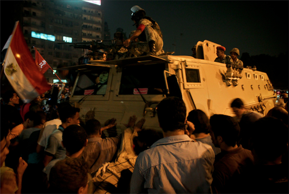 [19 August 2011, army tank stops protesters from heading to the Israeli Embassy, Cairo, Egypt. Image originally posted to Flickr by Nora Shalaby]