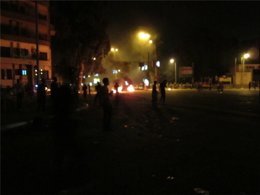 [9 September 2011, police attacks in Giza, Egypt. Image originally posted to Flickr by Gigi Ibrahim]