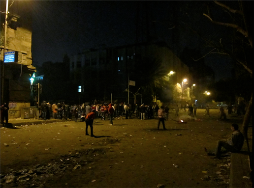 [4 February 2012, protesters clash with the police on Mansour St., Cairo, Egypt. Image originally posted to Flickr by Gigi Ibrahim]