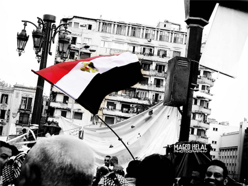 [9 February 2011, protests in Tahrir Square during the January 25 Revolution, Cairo, Egypt. Image originally posted to Flickr by Maged Helal]
