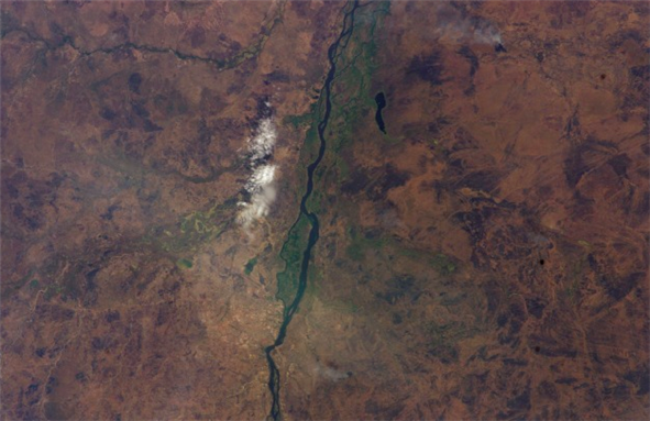 [Photo of Juba, South Sudan taken from the International Space Station (ISS) during Expedition 12. Image from Wikimedia Commons.]