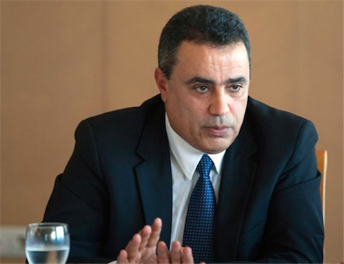 [In this 7 November 2013 photo, Mehdi Jomaa answers questions during a press meeting held in Tunis, Tunisia. A forum of political parties chose the industry minister as Tunisia`s next prime minister, set to replace the Islamist-led government with technocrats in what`s been a faltering transition to democracy. Jomaa, a fifty-year-old independent who had abandoned a career in the private sector, won the vote to head a transition government after weeks of contentious debate by twenty-one political parties, dubbed the \"national dialogue\" meant to pull Tunisia out of its impasse. Image by AP Photo.]
