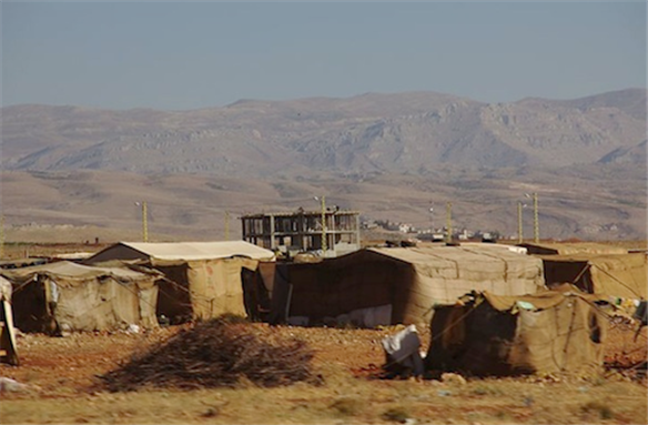 [Refugee camp in Lebanon close to the Syrian border. Image by Niels Elgaard Larsen, via Wikimedia Commons.]