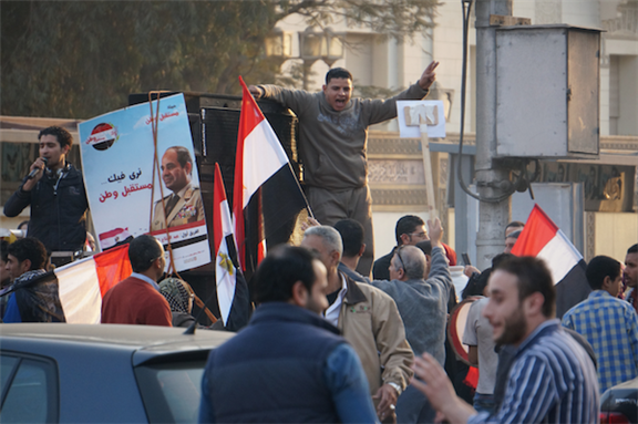 [25 Janaury 2014, pro-Sisi demonstration in Cairo. Image originally posted to Flickr by Sebastian Horndasch.]
