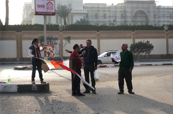 [25 January 2014, Abdel Fattah al-Sisi supporters in Cairo, Egypt. Image originally posted to Flickr by  Sebastian Horndasch.]