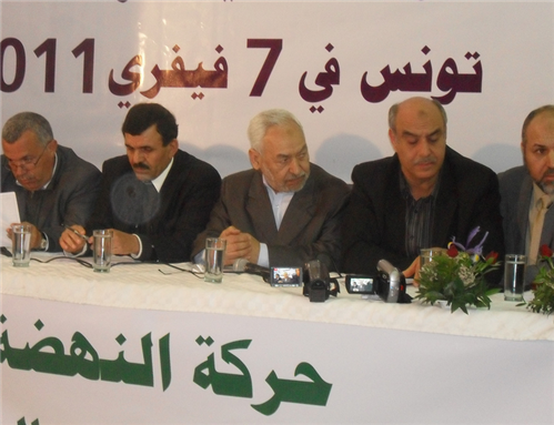 [Image of Ennahda members at a press briefing in Tunisia. Image courtesy of Magharebia/Flickr.]