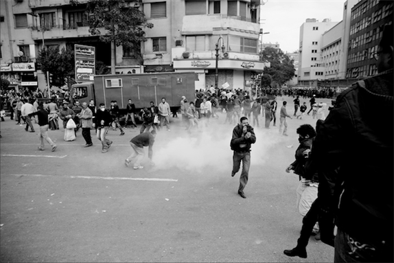 [19 November 2011, CSF disperse protesters in Mohammed Mahmoud Street, Cairo, Egypt. Image originally posted to Flickr by Hossam el-Hamalawy.]