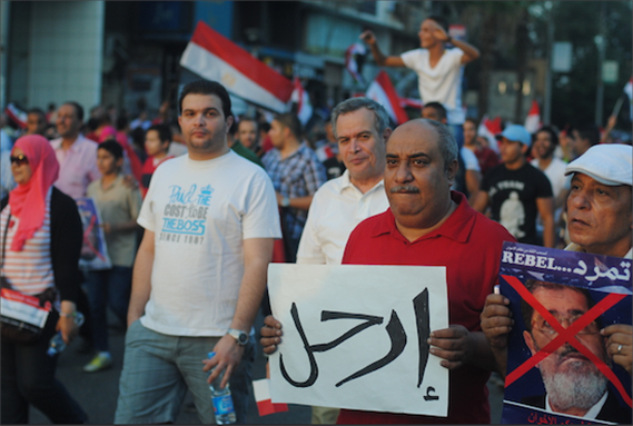 [28 June 2013, protesters take the streets demanding the disposal of Mohamed Morsi. Photo courtesy of Lilian Wagdy via Flickr.] 