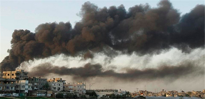 [Image of smoke rising after in Israeli strike in Gaza. Image by Amir Farshad Ebrahimi/Flickr.]