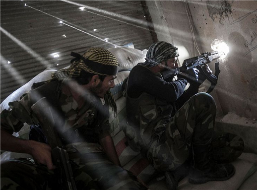 [Image of rebel fighters in Aleppo, Syria. Image by Freedom House via Flickr.]