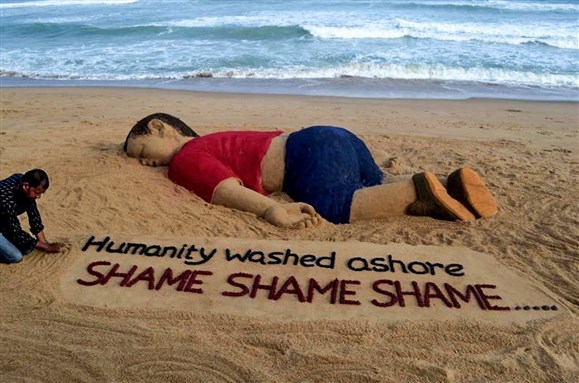 [Image of Aylan Kurdi sand sculpture, Image by Freedom House via flickr]