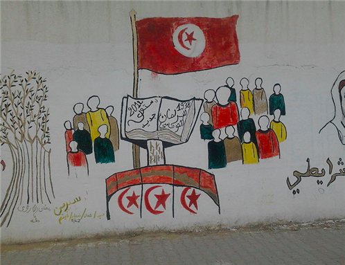 [Image of graffiti in El Mourouj, Tunisia. Image by Wael Ghabara/Wikimedia Commons]